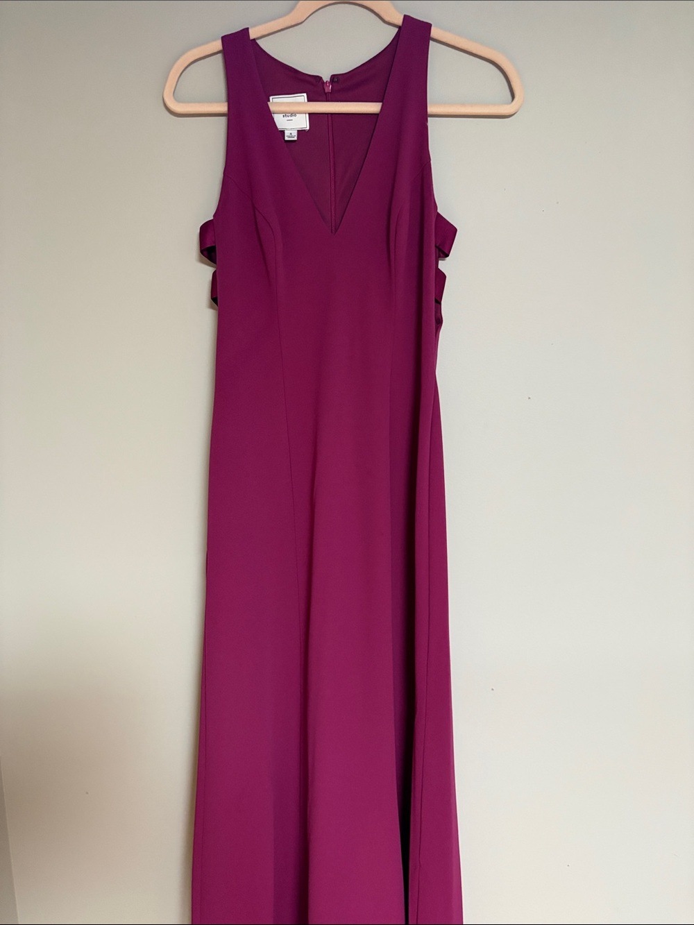 DB Studio Bridesmaid Dress. Berry Color, Magenta. Cut outs on either side.